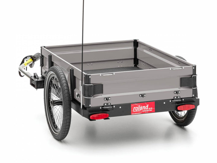 ROLAND Carrie M.e Sidevæg